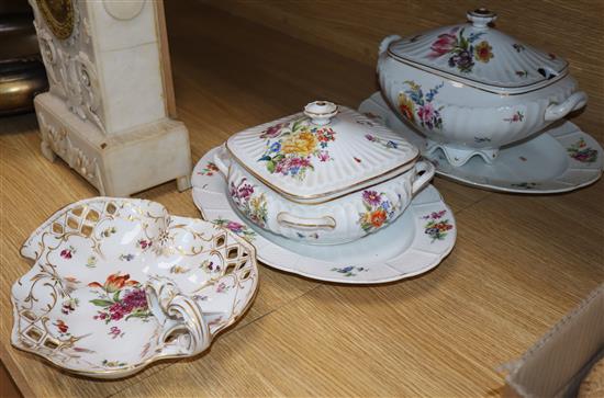 Two German porcelain floral painted tureens, two meat dishes and a shaped dish (5)